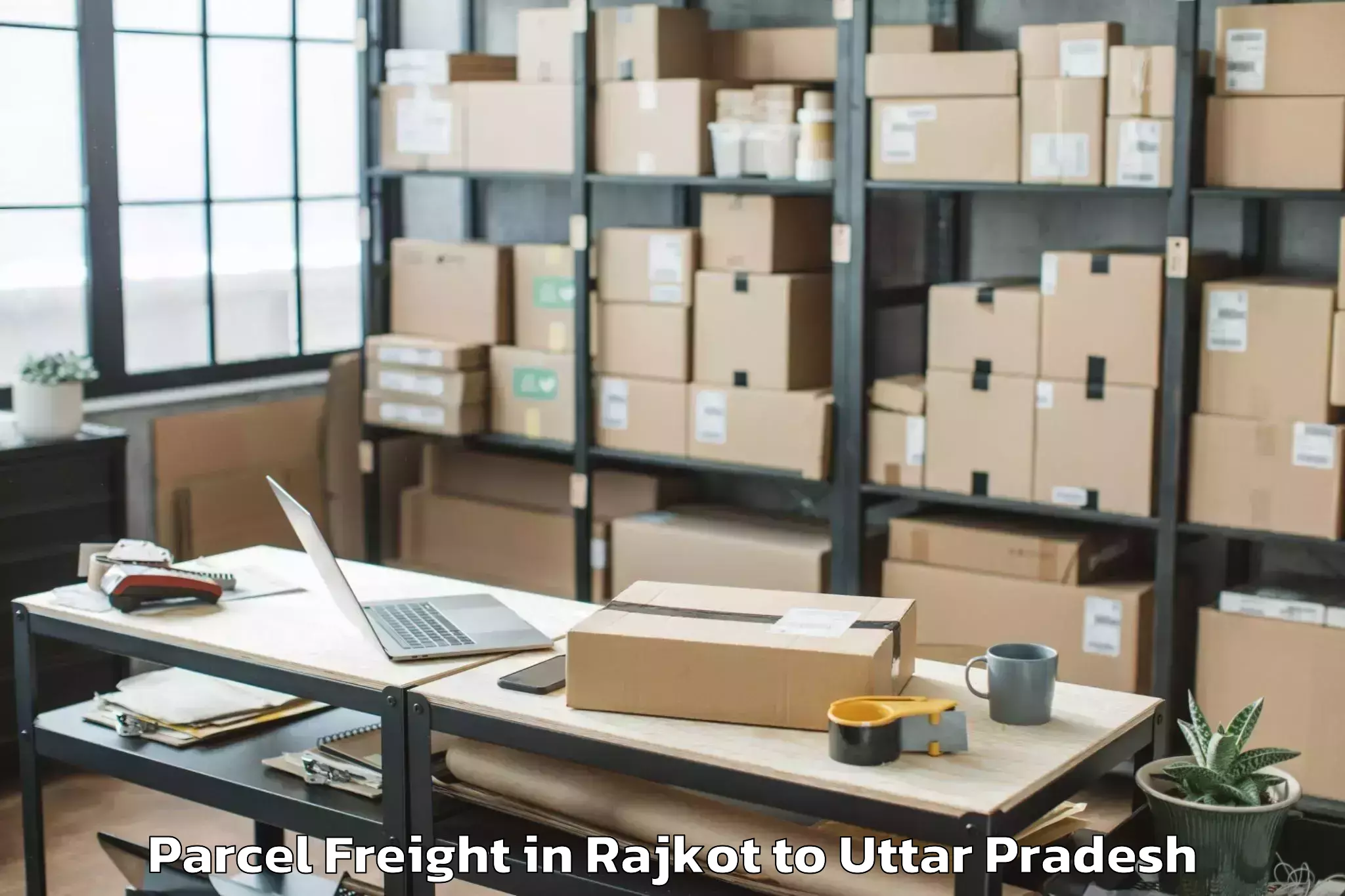 Leading Rajkot to Kirakat Parcel Freight Provider